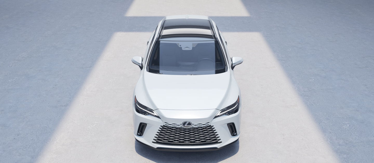 Lexus HYBRID with Ultra White EXTERIOR, 21-inch 20-spoke alloy wheels with Dark Gray Metallic and machined finish angle 1 