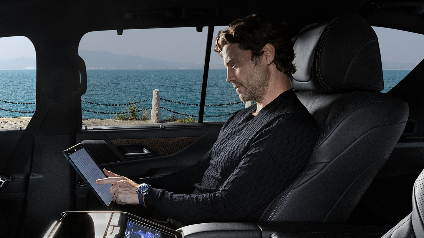Man in a car.