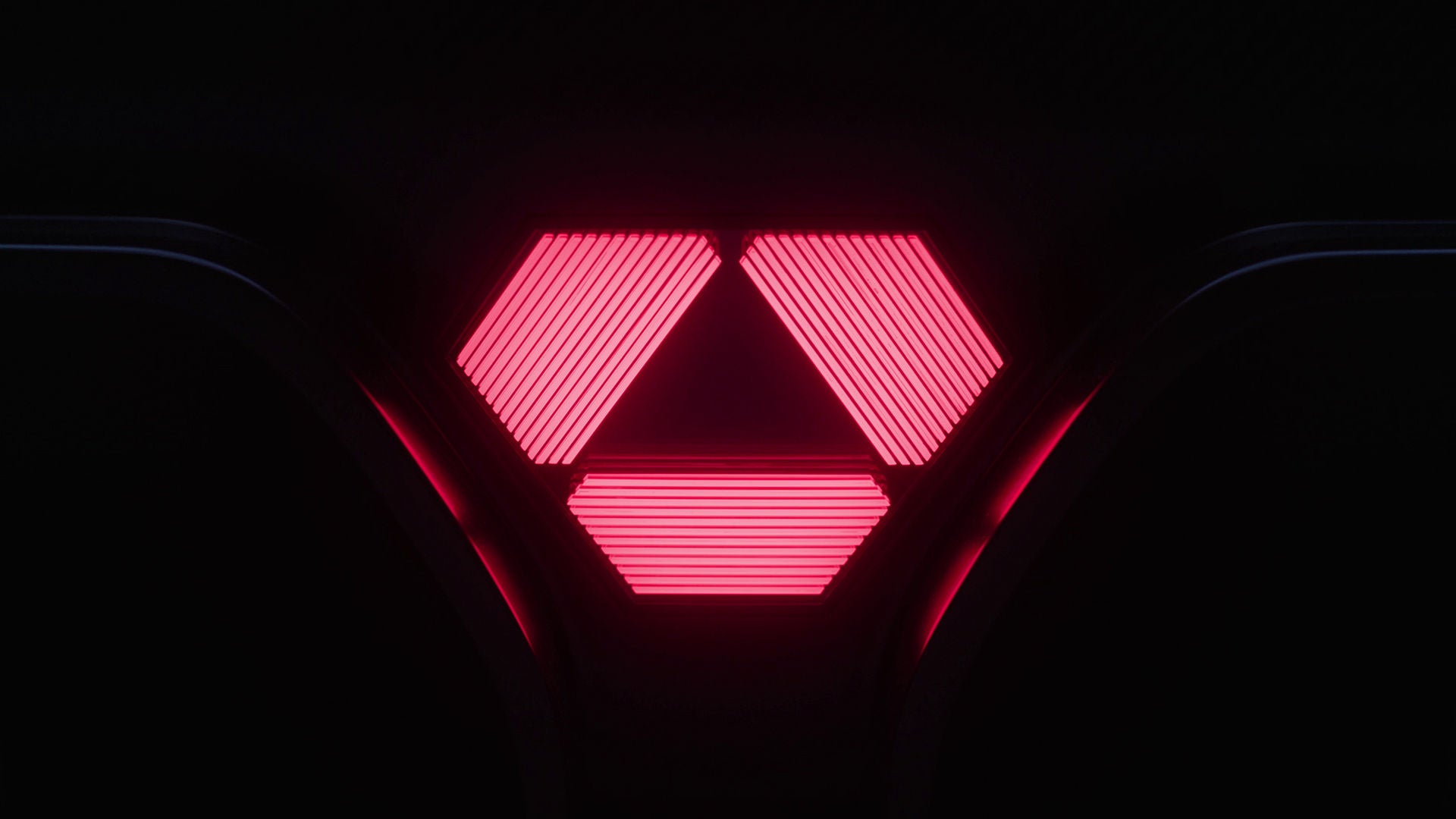 Close-up of a red triangular illumination at the low rear center of the LFA Concept echoes the triple-exhaust-pipe design of the original LFA.