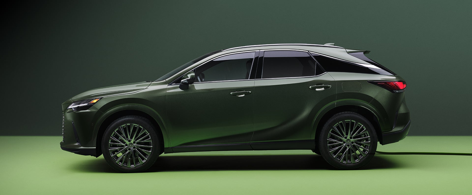 RX 450 Hybrid Plus Luxury all-wheel drive shown in Nori Green Pearl.