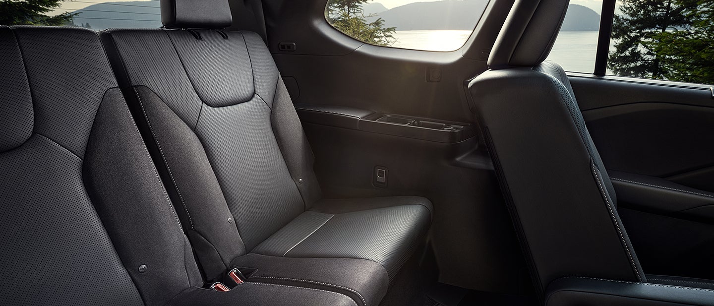 Interior of Lexus TX 550h Plus shown with semi-aniline leather seating.