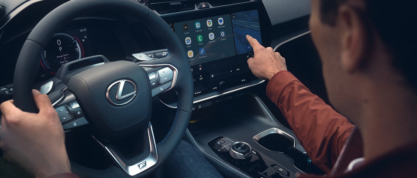 Detail of a finger touching the touchscreen display.