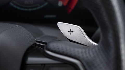 Steering-wheel-mounted paddle shifters provide fingertip control.