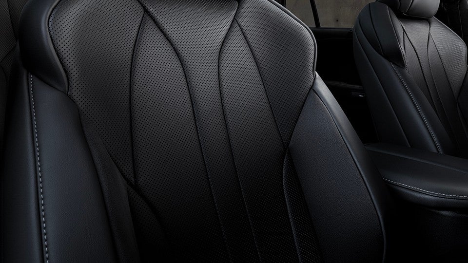 F SPORT seat bolsters hug the driver and front-seat passenger through turns.